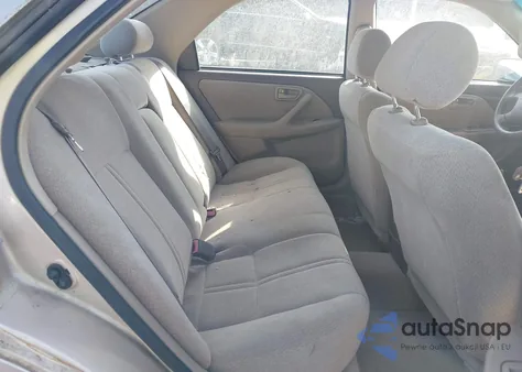 2001 Toyota Camry Le z USA, uszkodzony, nr VIN 4T1BG22K41U079287